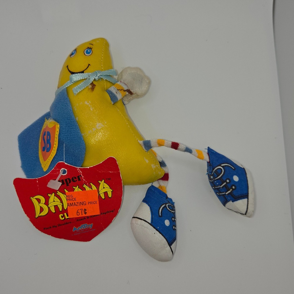 Vintage 1983 AmToy Super Banana Clip On Plush Toy Yellow Blue Superhero 4452